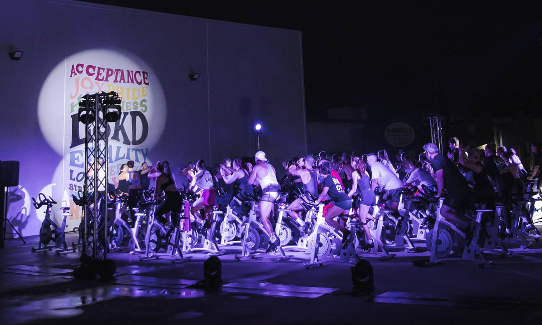 people at a pride 2023 event in australia riding bikes