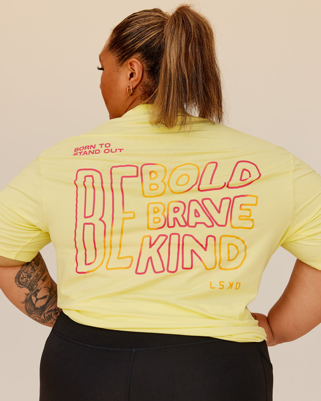 Woman wearing Bold Brave and Kind FLXCotton Oversized Tee - Lemon Fizz | Model:Lilz | Size:3XL