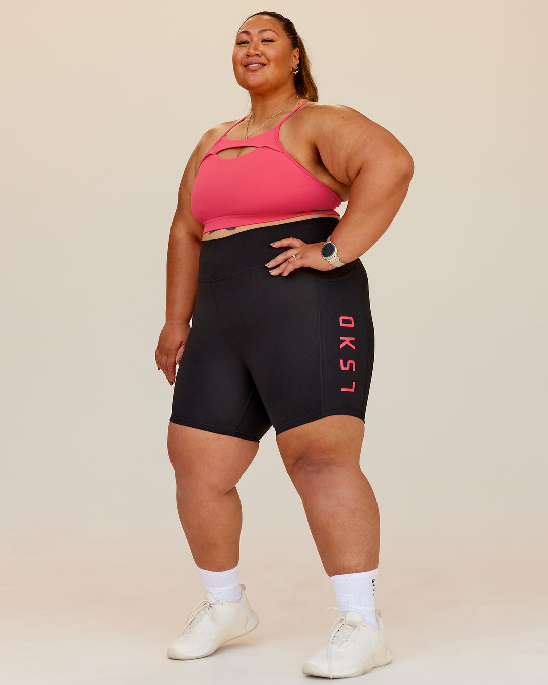 Woman wearing Rep Ultra High-Rise 6" Short Pockets - Black-Bright Raspberry | Model:Lilz | Size:3XL