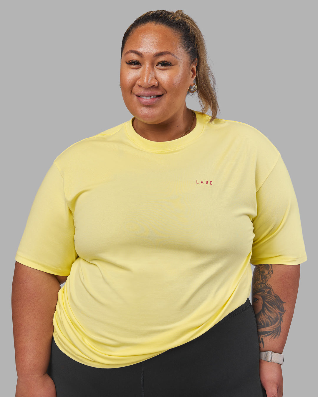 Woman wearing Bold Brave and Kind FLXCotton Oversized Tee - Lemon Fizz | Model:Lilz | Size:3XL