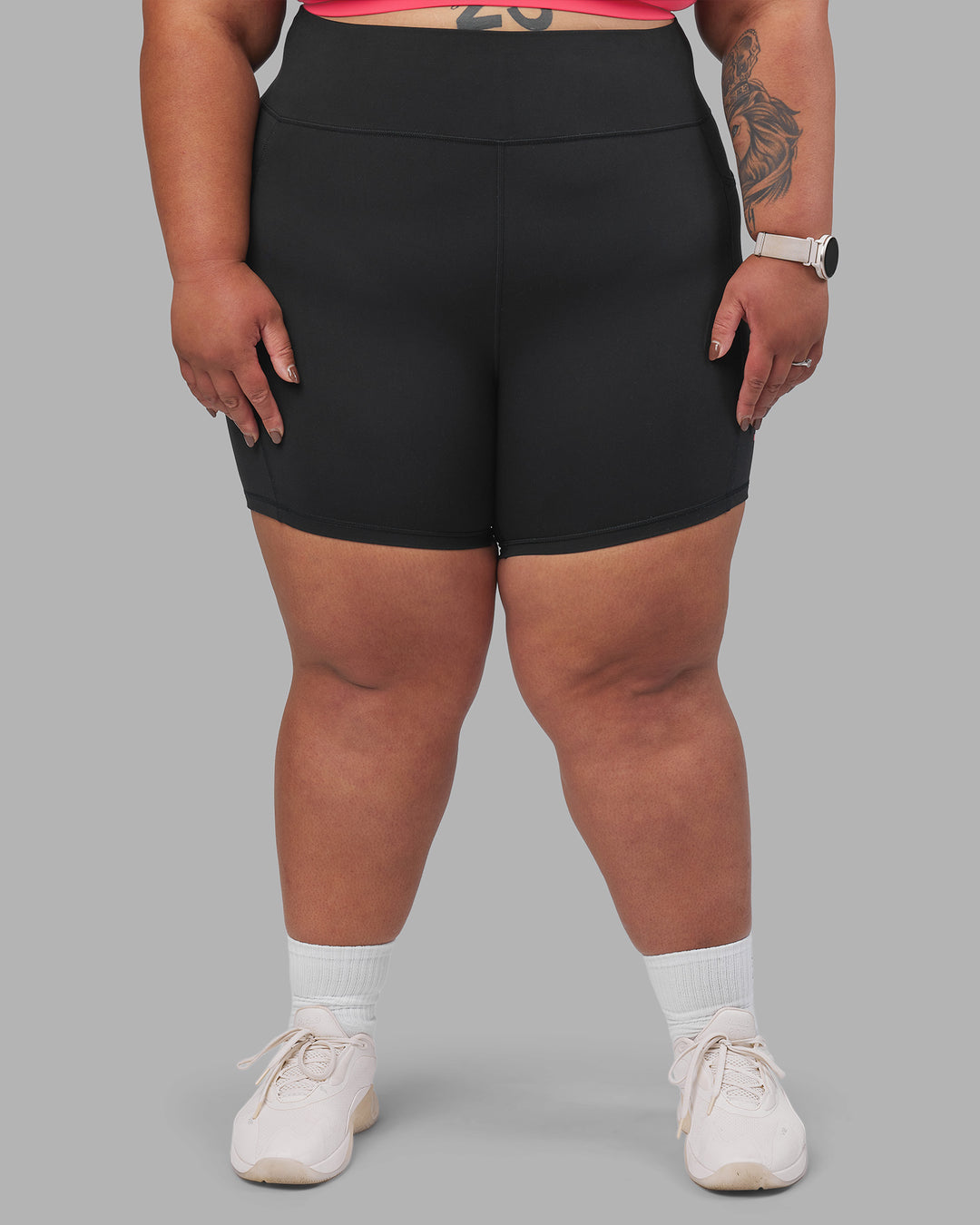Woman wearing Rep Ultra High-Rise 6" Short Pockets - Black-Bright Raspberry | Model:Lilz | Size:3XL