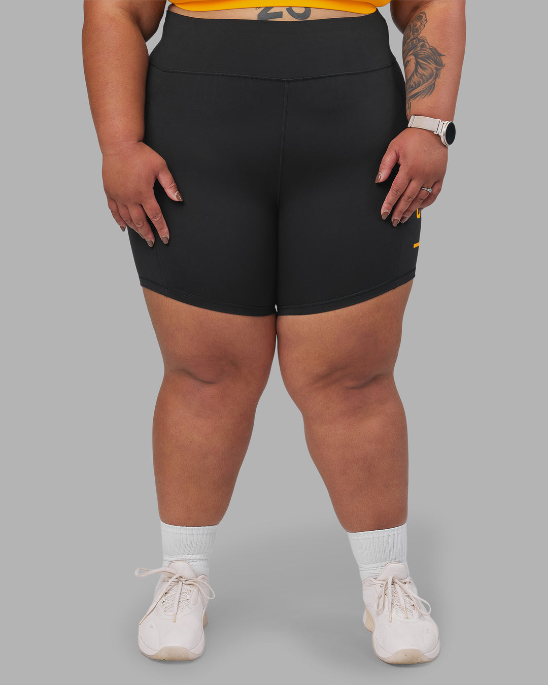 Woman wearing Rep Ultra High-Rise 6" Short Pockets - Black-Zinnia | Model:Lilz | Size:3XL