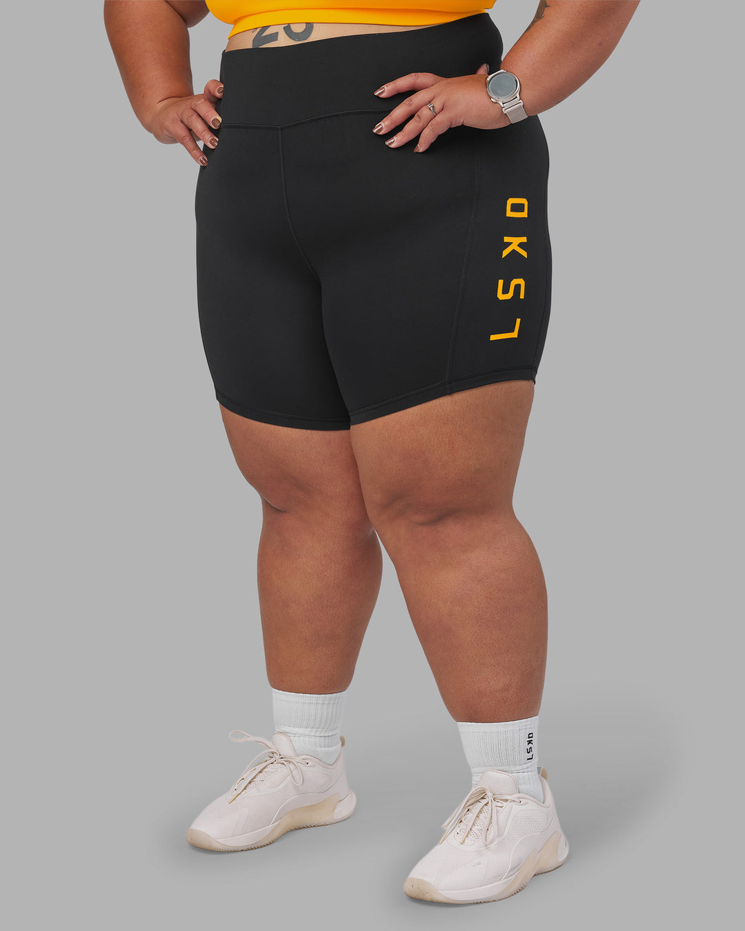 Woman wearing Rep Ultra High-Rise 6" Short Pockets - Black-Zinnia | Model:Lilz | Size:3XL