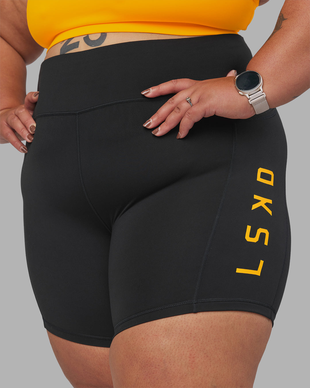 Woman wearing Rep Ultra High-Rise 6" Short Pockets - Black-Zinnia | Model:Lilz | Size:3XL