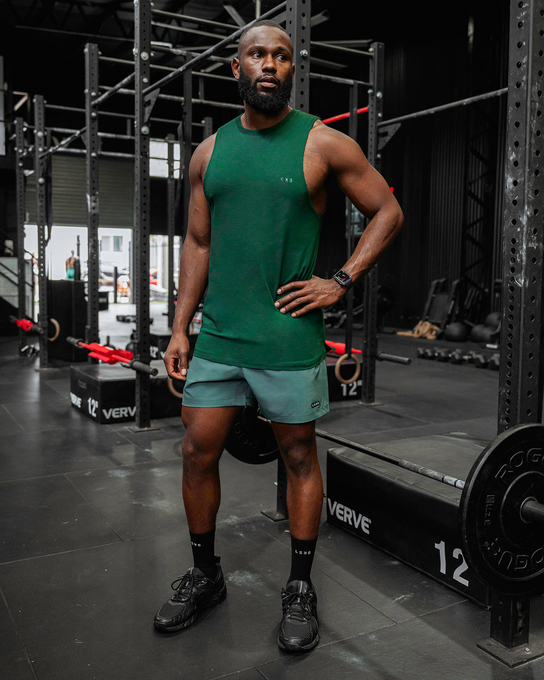 Man wearing Deluxe PimaFLX Tank - Deep Emerald