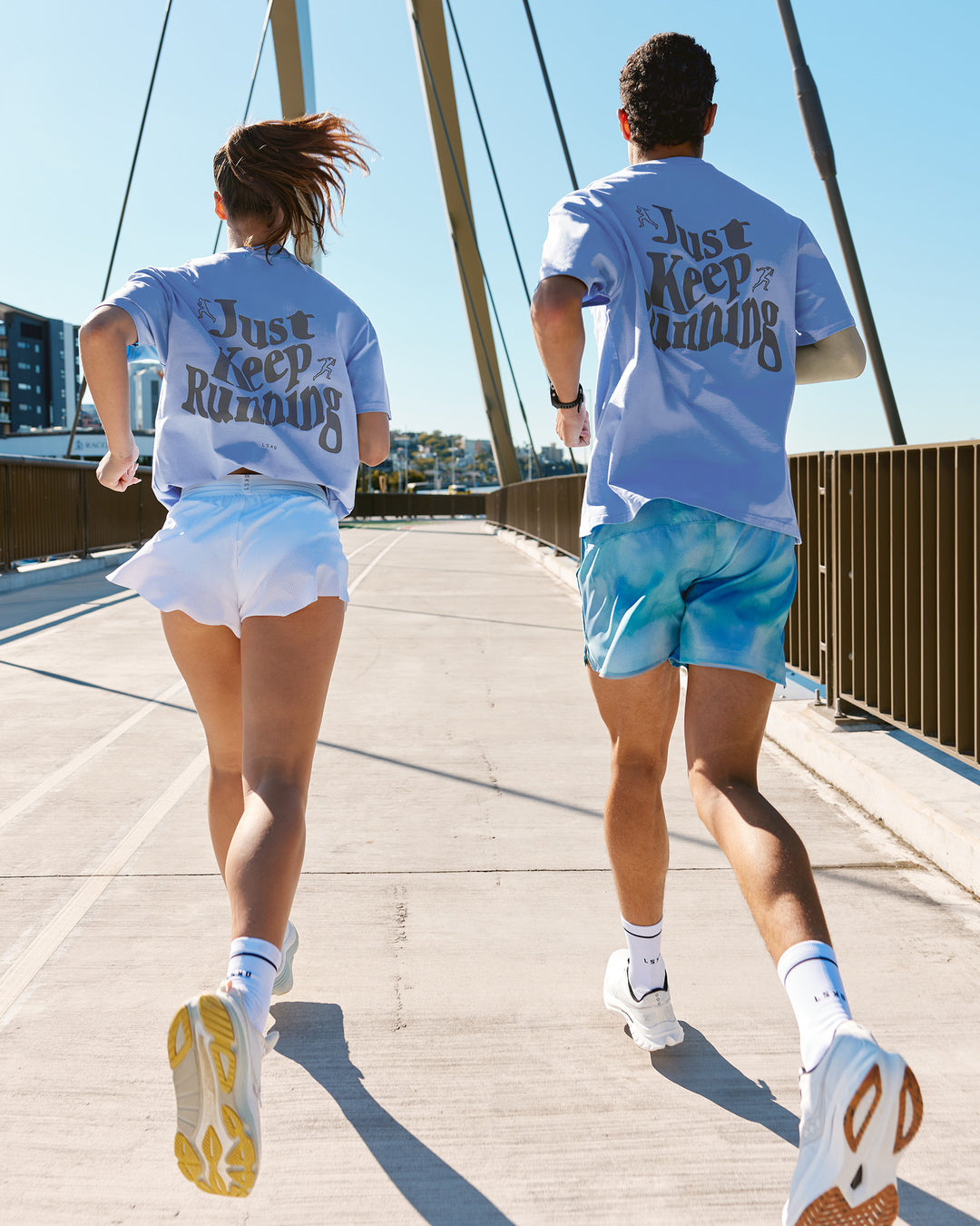 Duo wearing Just Run FLXCotton Oversized Tee - Soft Blue-Dark Storm | Model:Both | Size:Duo