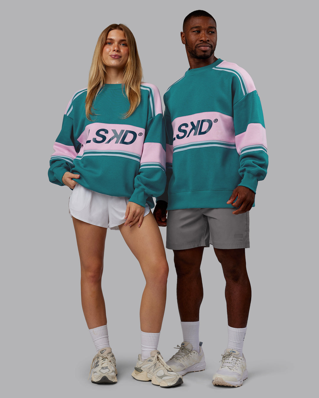 Duo wearing A-Team Sweater Oversize - Blue Coral-Festival Bloom | Model:Both | Size:Duo
