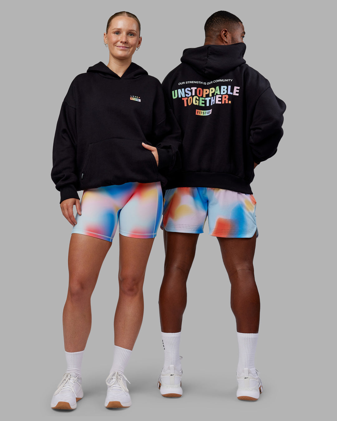 Duo wearing Fitstop Unstoppable Together Oversized Hoodie - Black | Model:Both | Size:Duo