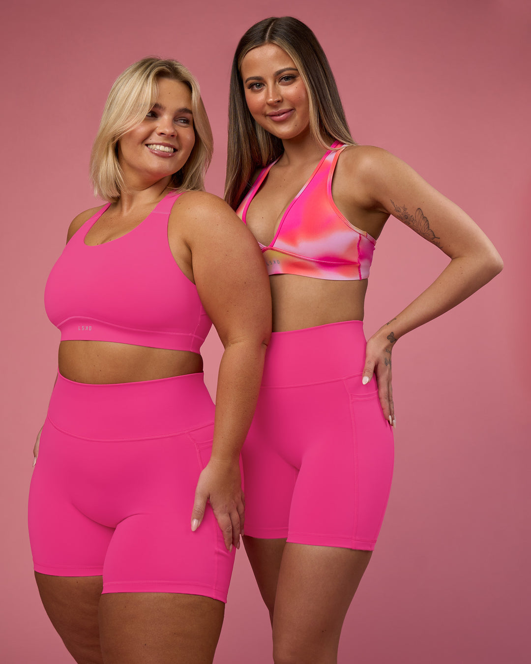 Woman wearing Fusion Ultra High-Rise 6" Short Pockets - Ultra Pink | Model:Duo | Size:Both