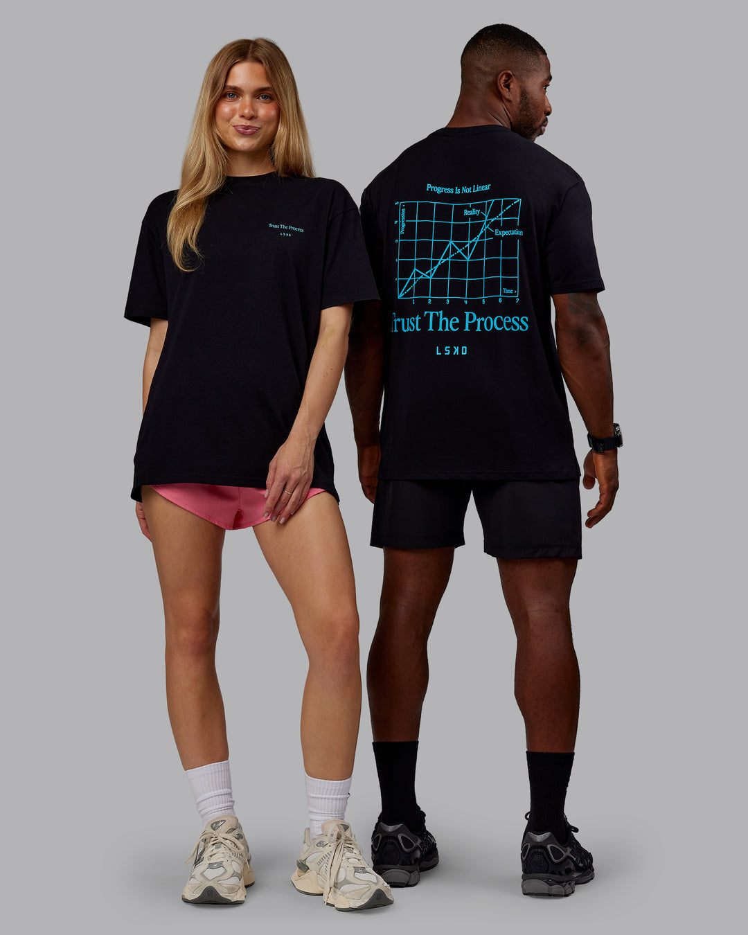 Duo wearing Trust The Process 2.0 FLXCotton Tee Oversize - Black-Blue Atoll | Model:Both | Size:Duo