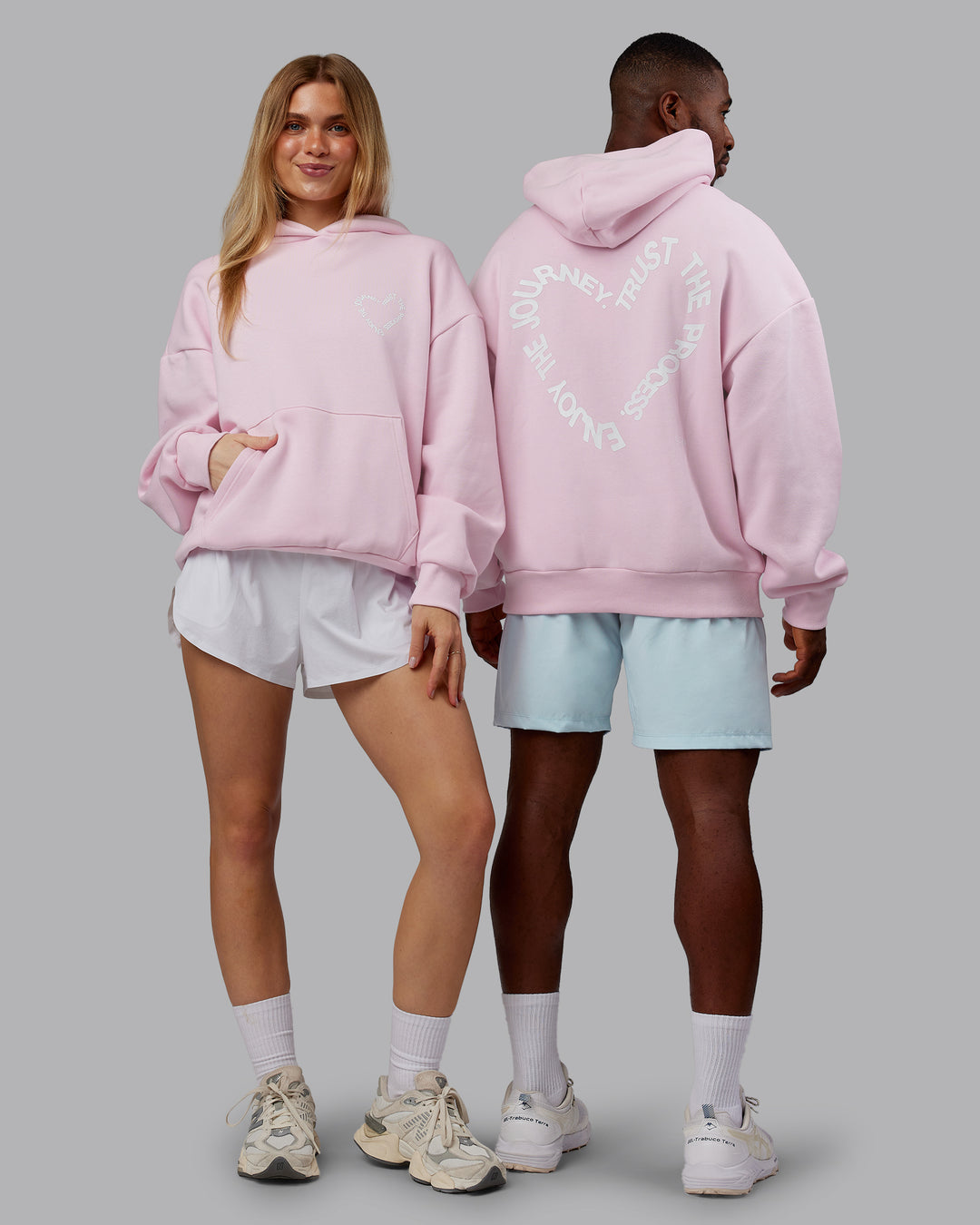 Duo wearing Unisex Love The Process Oversize Hoodie - Petal Pink-White | Model:Both | Size:Duo