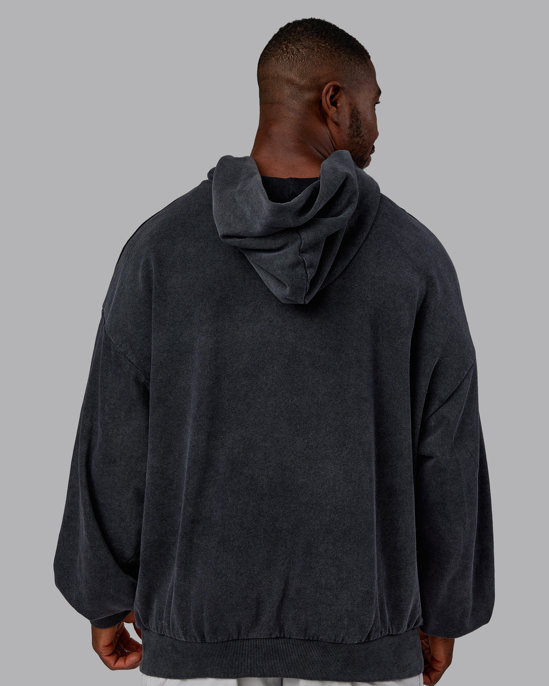 Man wearing Chrome Washed Oversized Hoodie - Black | Model:Sam | Size:L