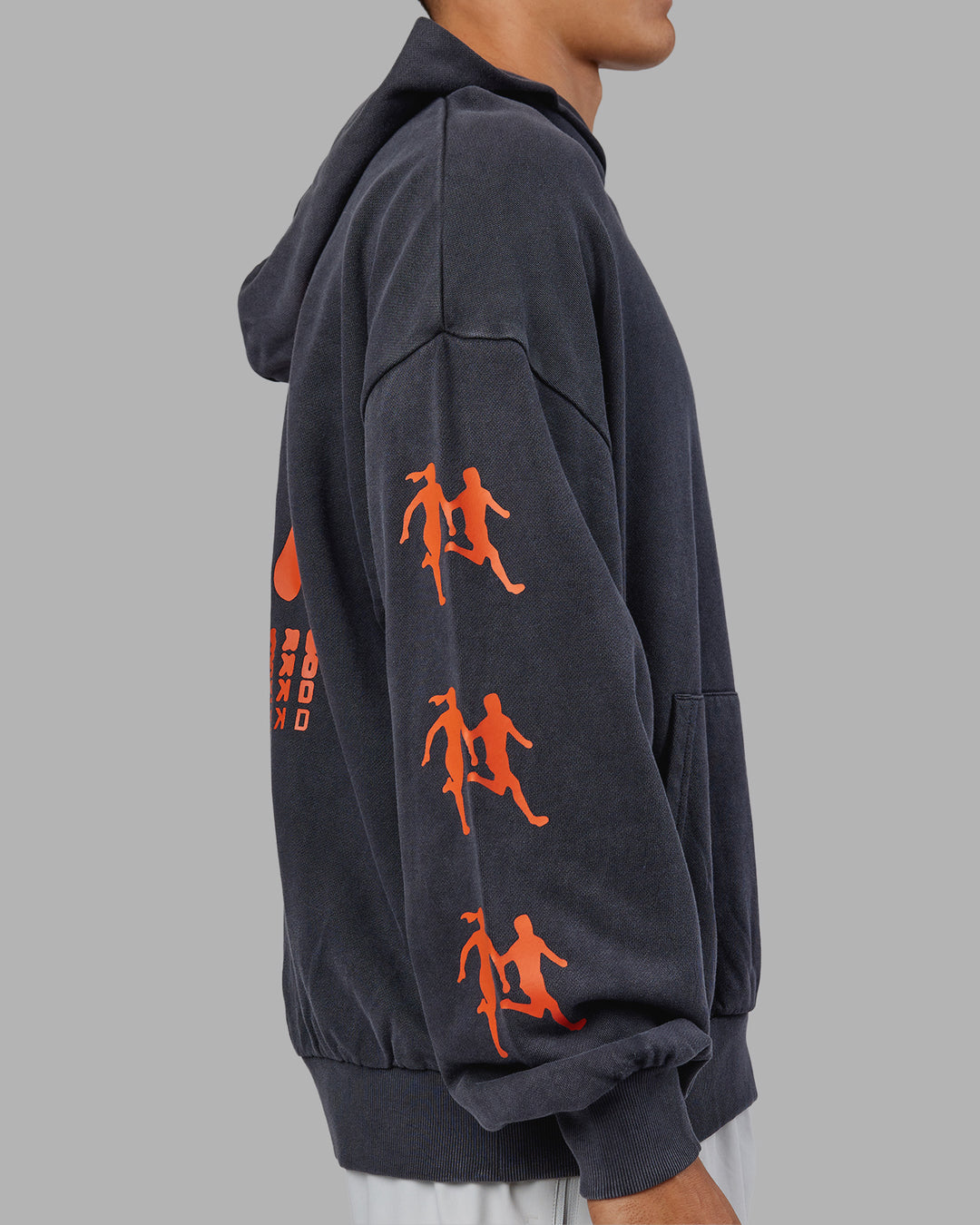 Man wearing Journey Washed Unisex Oversize Hoodie - Black-Ultra Orange | Model:Jackson | Size:L