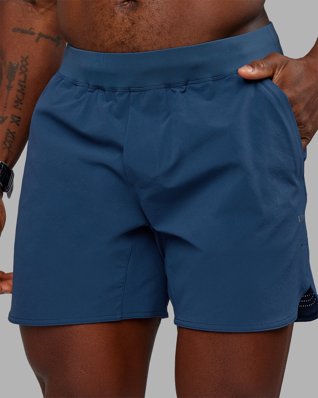 Man wearing Lift 6" Short - Indigo | Model:Sam | Size:L