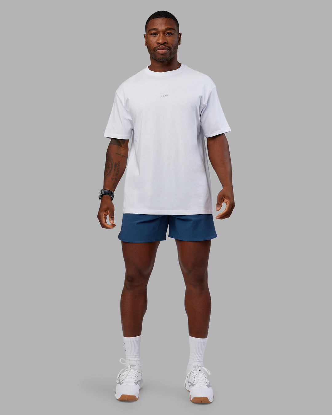 Man wearing Lift 6" Short - Indigo | Model:Sam | Size:L