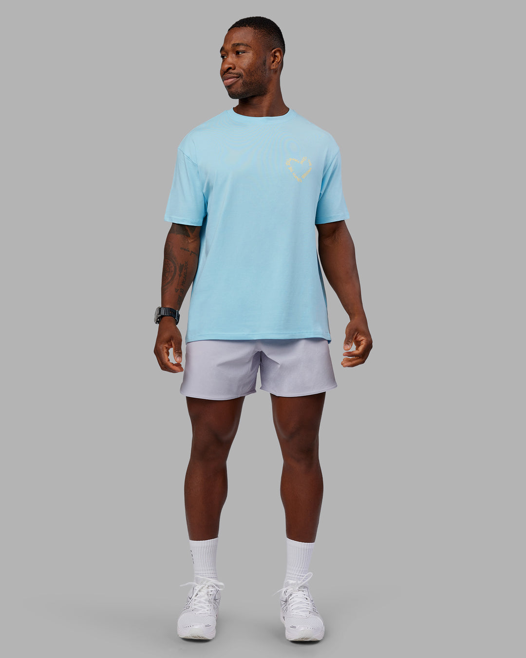 Man wearing Love The Process FLXCotton Oversize Tee - Crystal Blue-Lemon | Model:Sam | Size:L