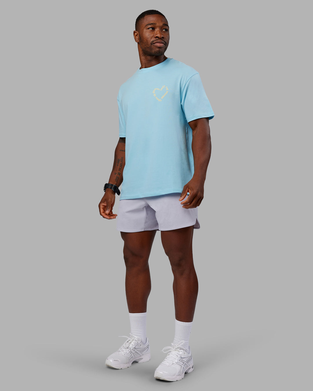 Man wearing Love The Process FLXCotton Oversize Tee - Crystal Blue-Lemon | Model:Sam | Size:L