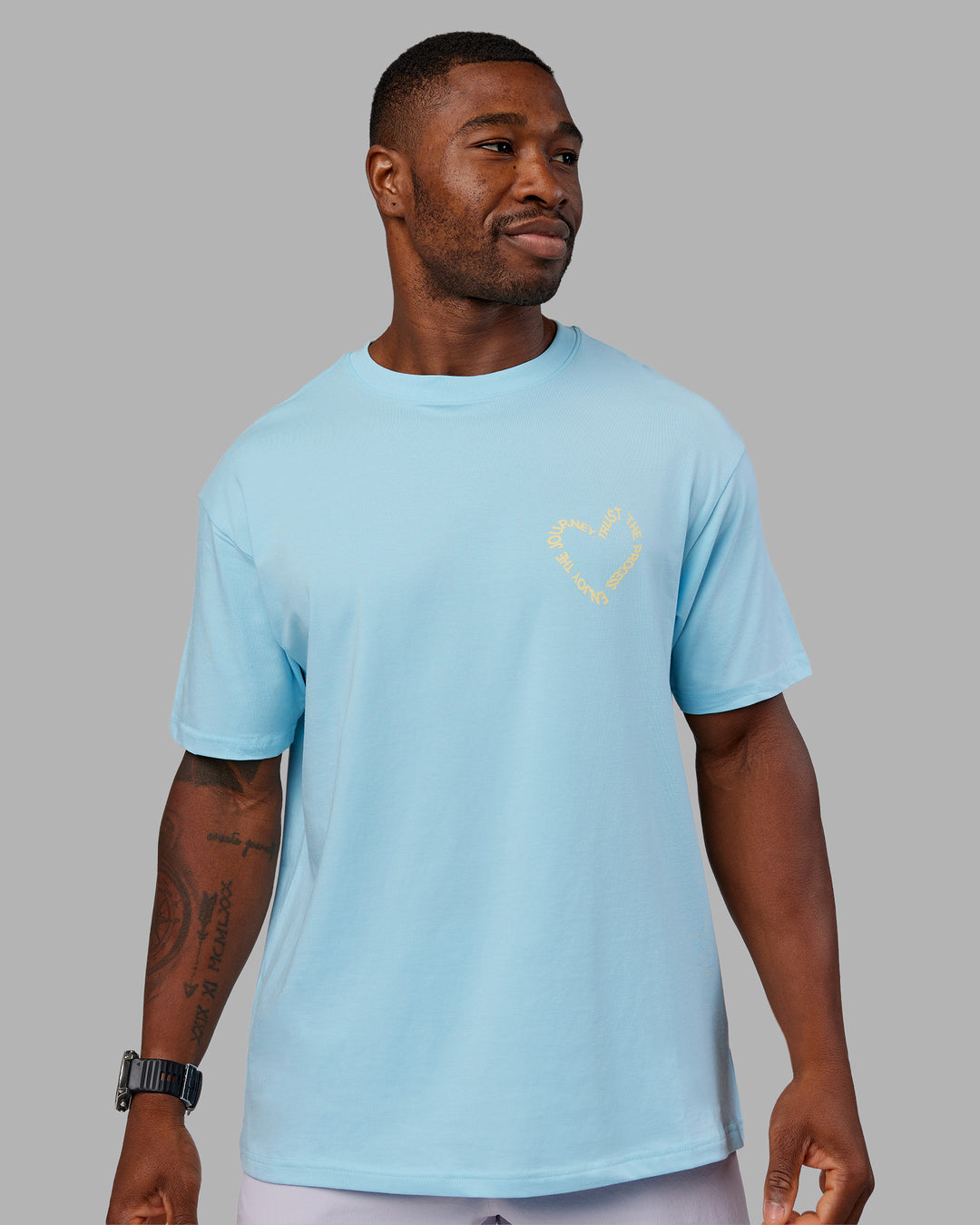 Man wearing Love The Process FLXCotton Oversize Tee - Crystal Blue-Lemon | Model:Sam | Size:L