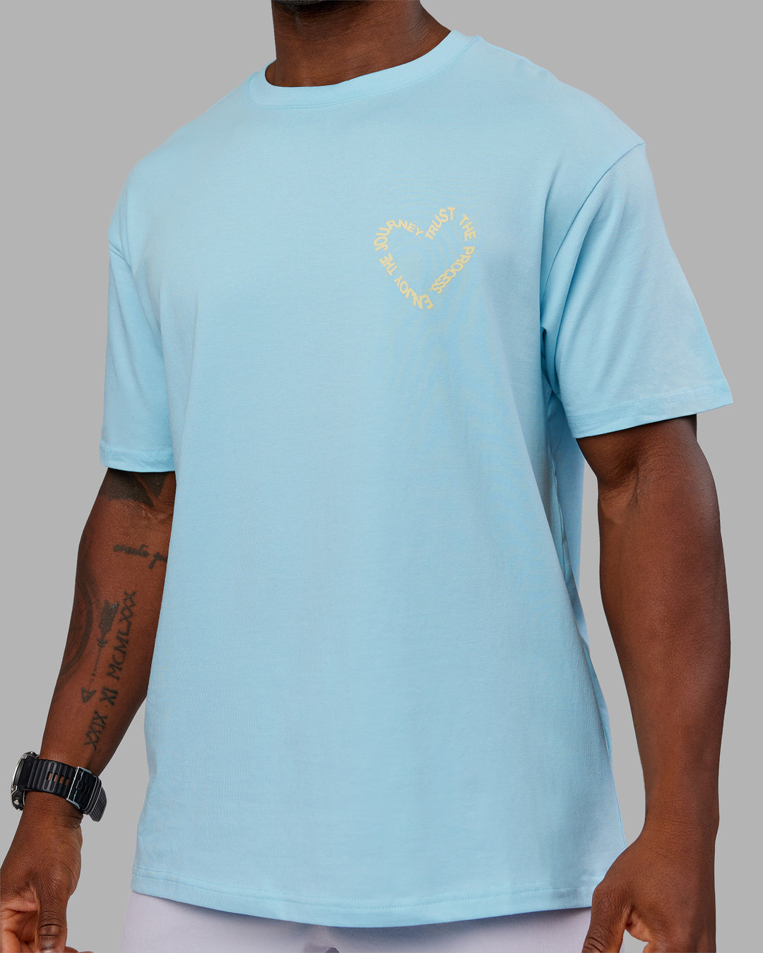 Man wearing Love The Process FLXCotton Oversize Tee - Crystal Blue-Lemon | Model:Sam | Size:L