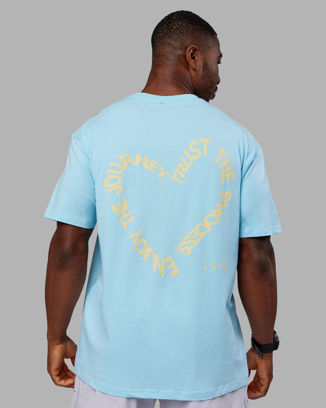 Man wearing Love The Process FLXCotton Oversize Tee - Crystal Blue-Lemon | Model:Sam | Size:L