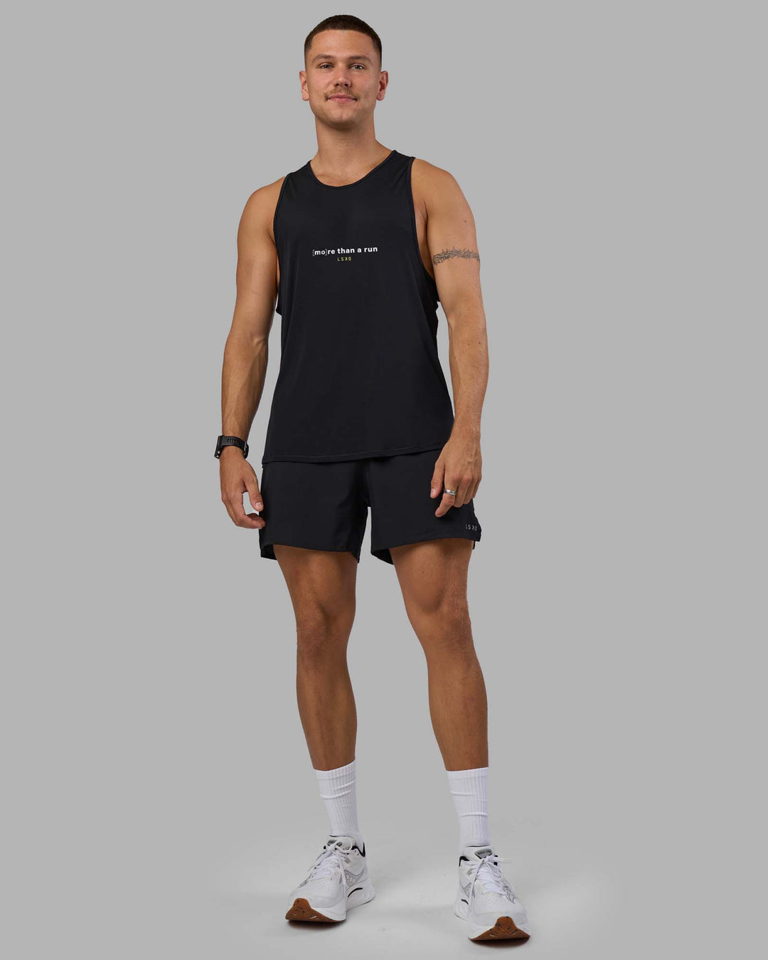 Man wearing MTAR Mens Pace Running Tank - Black | Model:Nikola | Size:L