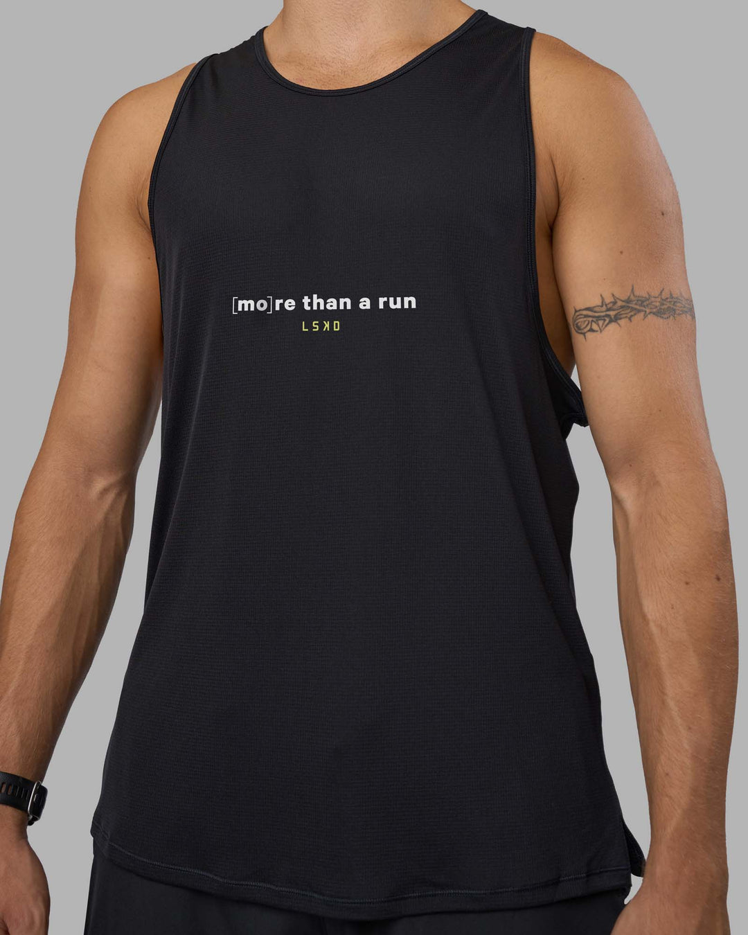 Man wearing MTAR Mens Pace Running Tank - Black | Model:Nikola | Size:L