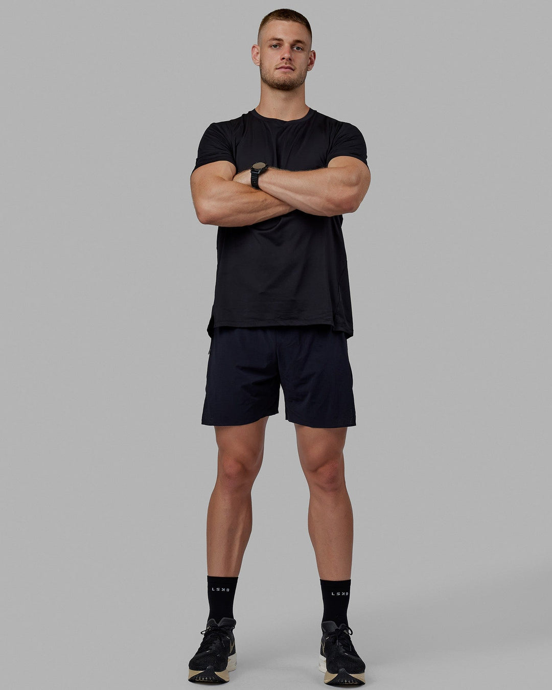 Man wearing Pace Running Tee - Black