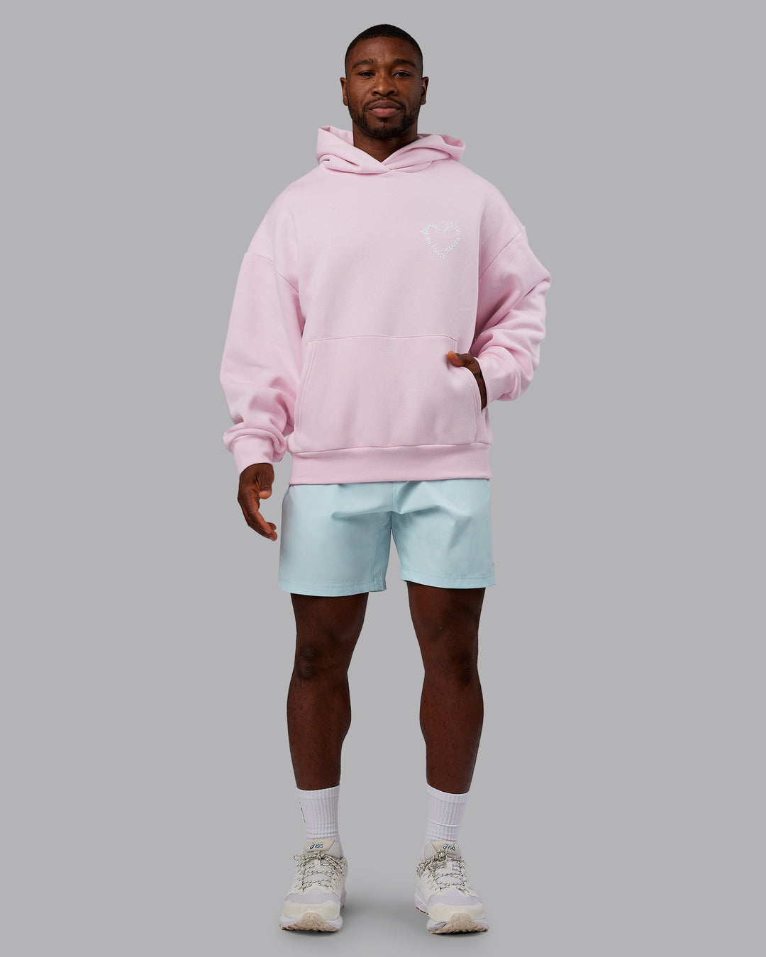 Man wearing Unisex Love The Process Oversize Hoodie - Petal Pink-White | Model:Sam | Size:L