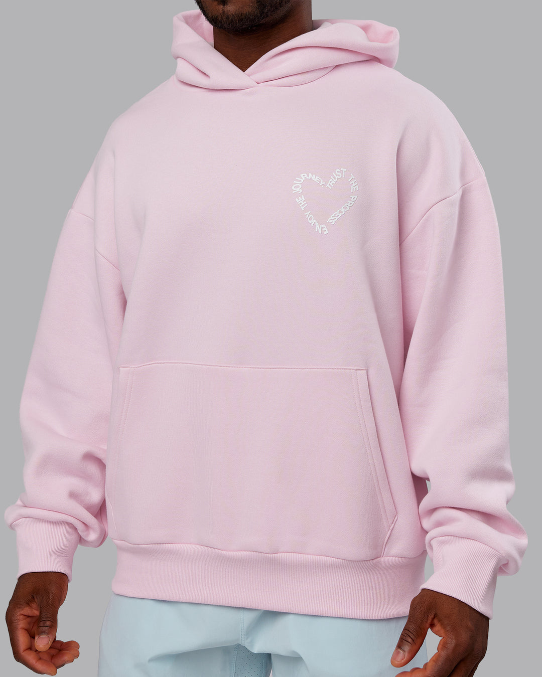 Man wearing Unisex Love The Process Oversize Hoodie - Petal Pink-White | Model:Sam | Size:L