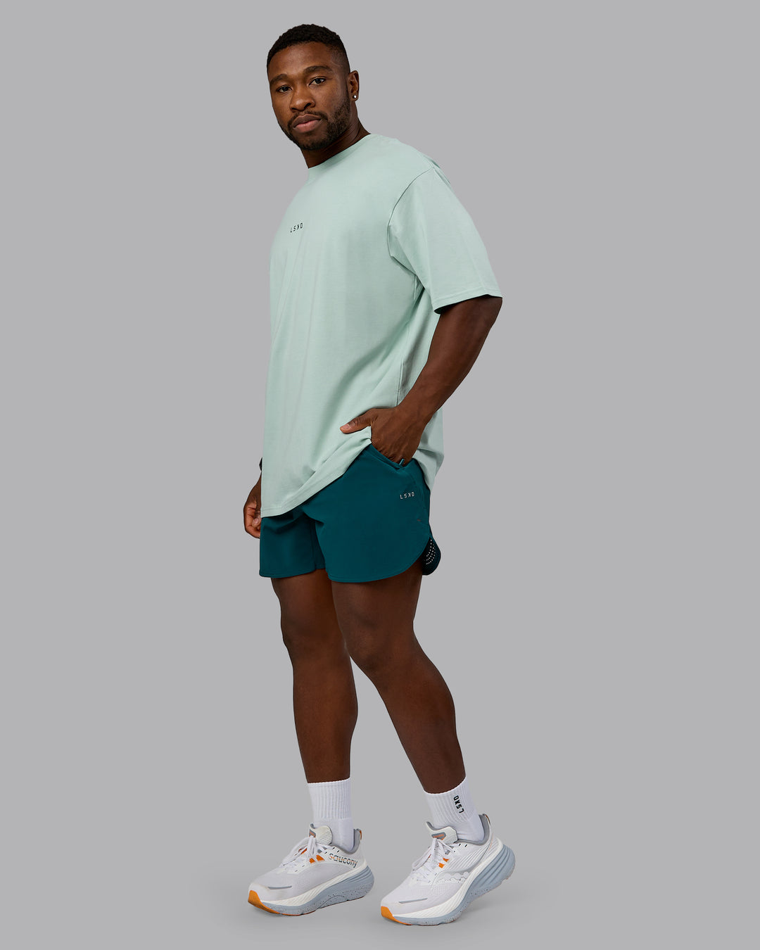 Man wearing On Repeat FLXCotton Oversized Tee - Blue Haze-Dark Moss | Model:Sam | Size:L