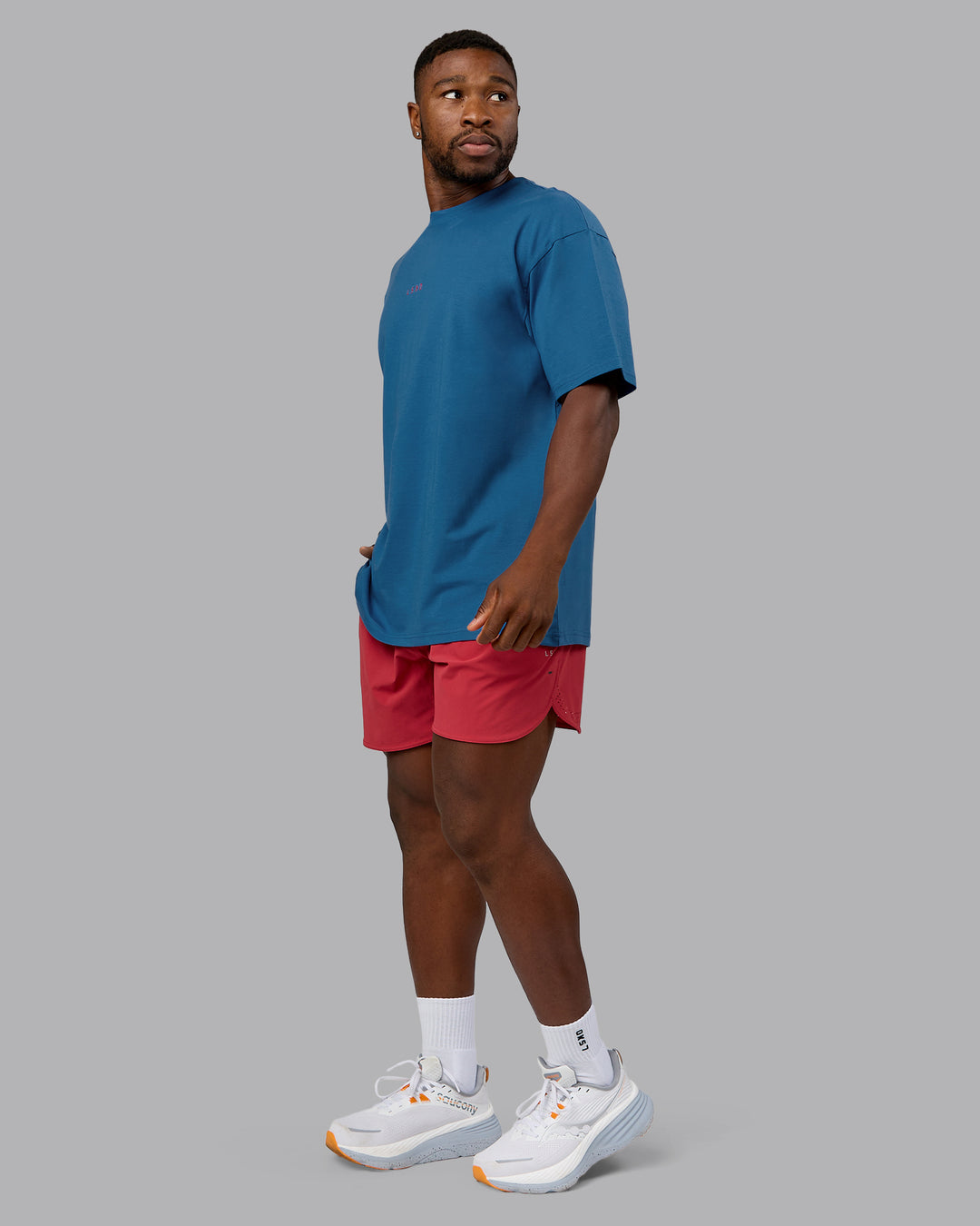 Man wearing On Repeat FLXCotton Oversized Tee - High Tide-Claret | Model:Sam | Size:L