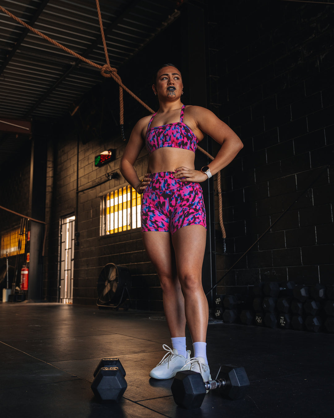 Woman wearing Fusion High-Rise 4" Short Pockets - Pink Luminous | Model:Teraipine | Size:M