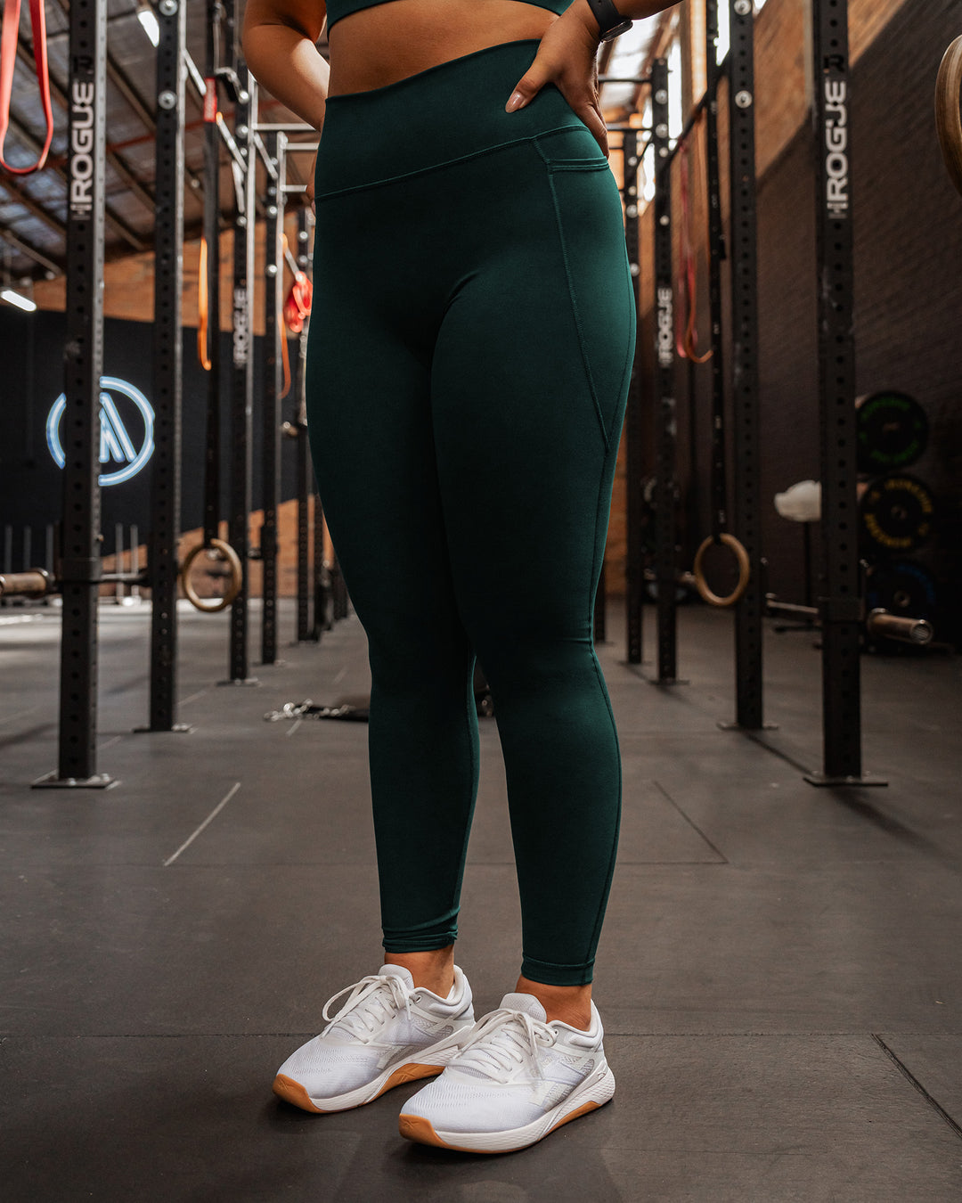 Woman wearing Fusion Ultra High-Rise Full Length Legging Pockets - Dark Moss | Model:Gloria | Size:M