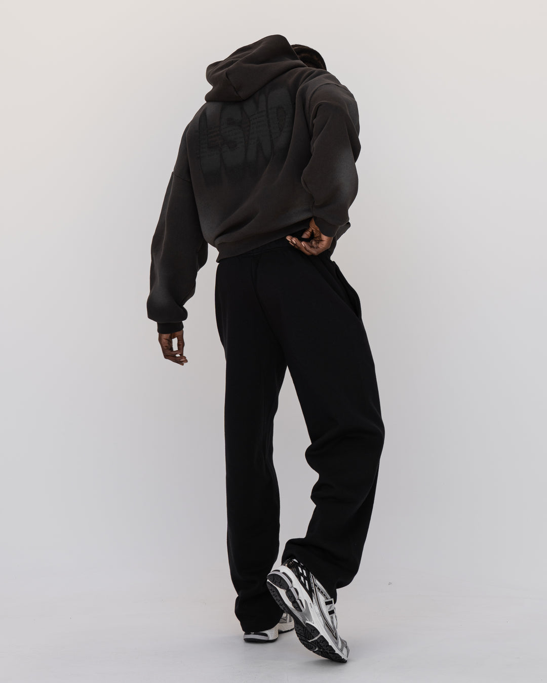 Man wearing Memory In Motion 500gsm Ultra Heavyweight Washed Hoodie - Charcoal Washed | Model:Okello | Size:M