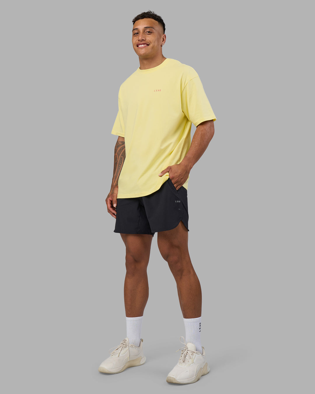 Man wearing Bold Brave and Kind FLXCotton Oversized Tee - Lemon Fizz | Model:Daarian | Size:M