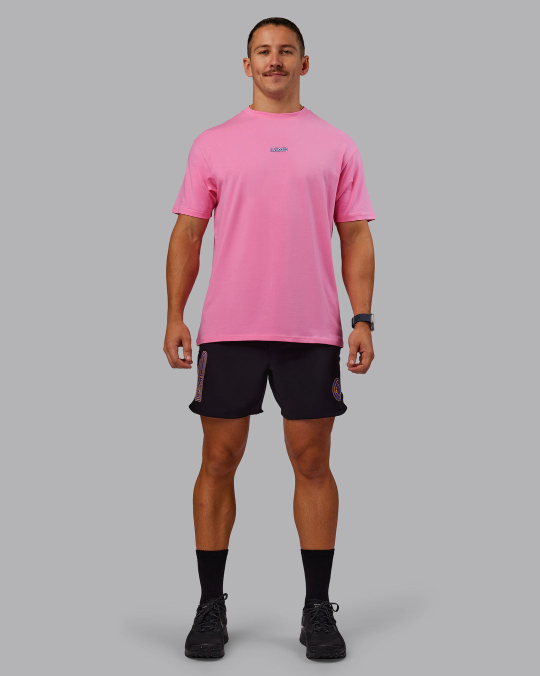 Man wearing CFT BNE 25 Lift 6" Short - Black-Warm Apricot | Model:Jaiden | Size:M