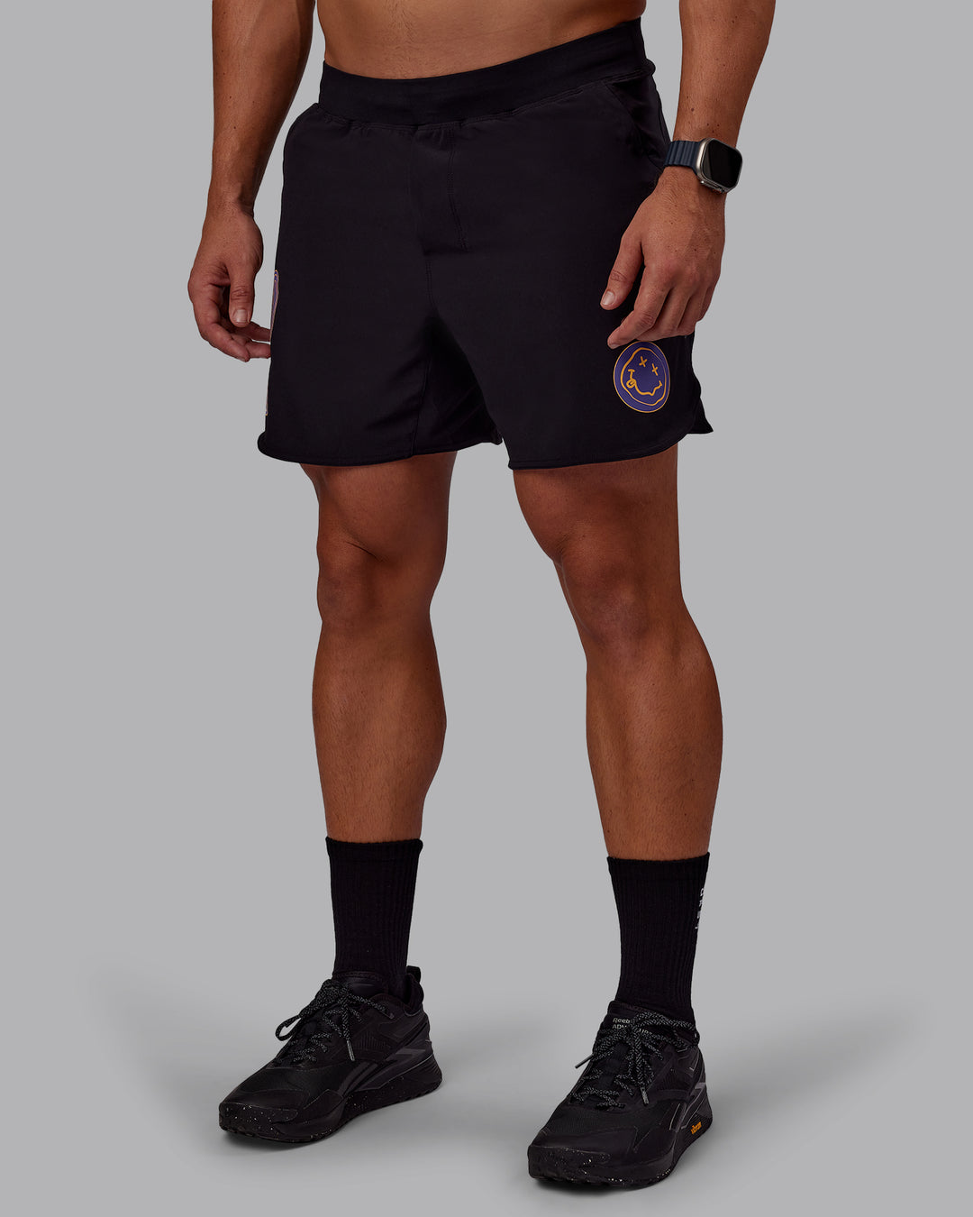 Man wearing CFT BNE 25 Lift 6" Short - Black-Warm Apricot | Model:Jaiden | Size:M