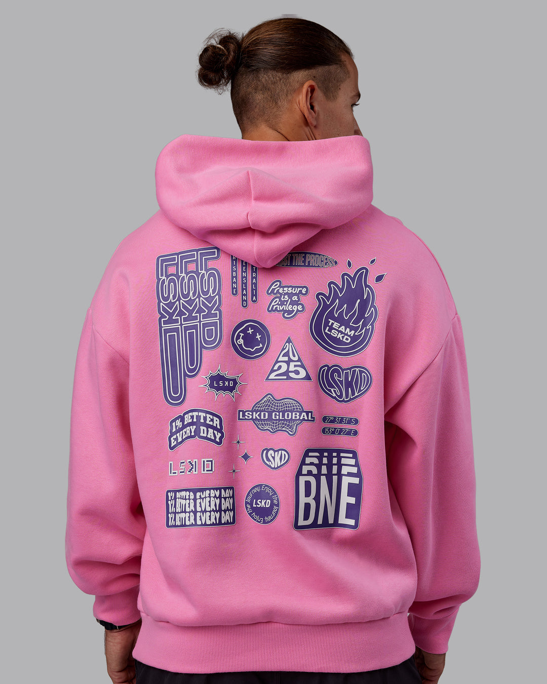 Man wearing CFT BNE 25 Oversized Hoodie - Candy Pink-Purple Opulence | Model:Jaiden | Size:M