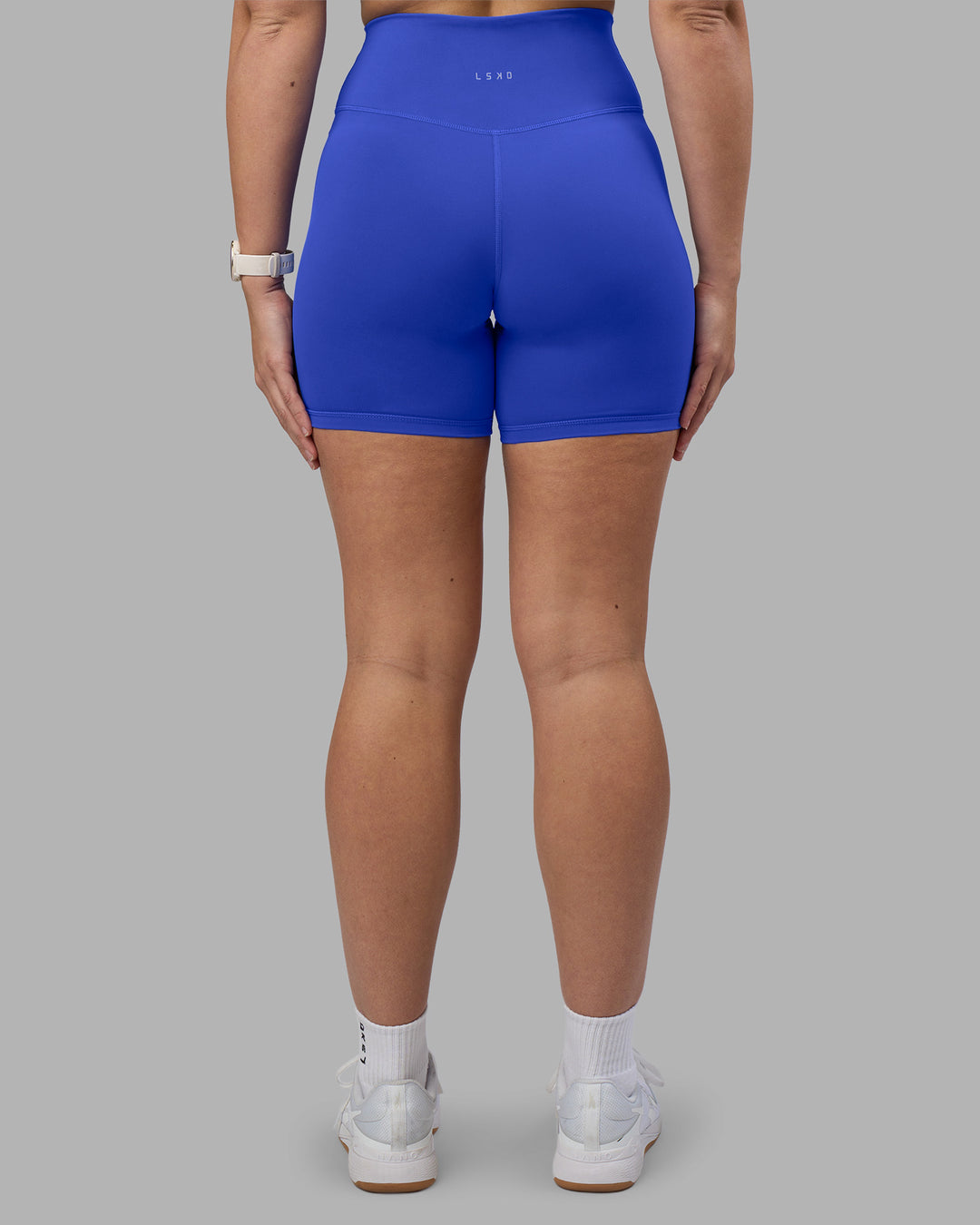 Woman wearing Fusion Ultra High-Rise 6" Short - Power Cobalt | Model:Amy | Size:M