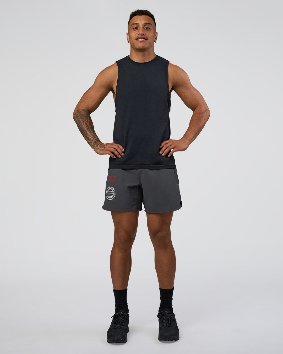 Man wearing Lift 6" Short - Dark Storm-Scarlet | Model:Daarian | Size:M