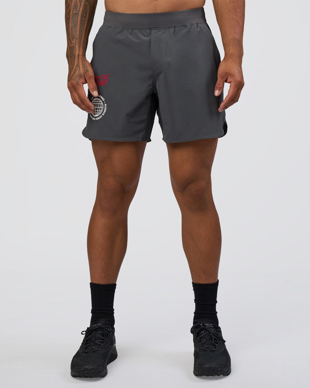 Man wearing Lift 6" Short - Dark Storm-Scarlet | Model:Daarian | Size:M