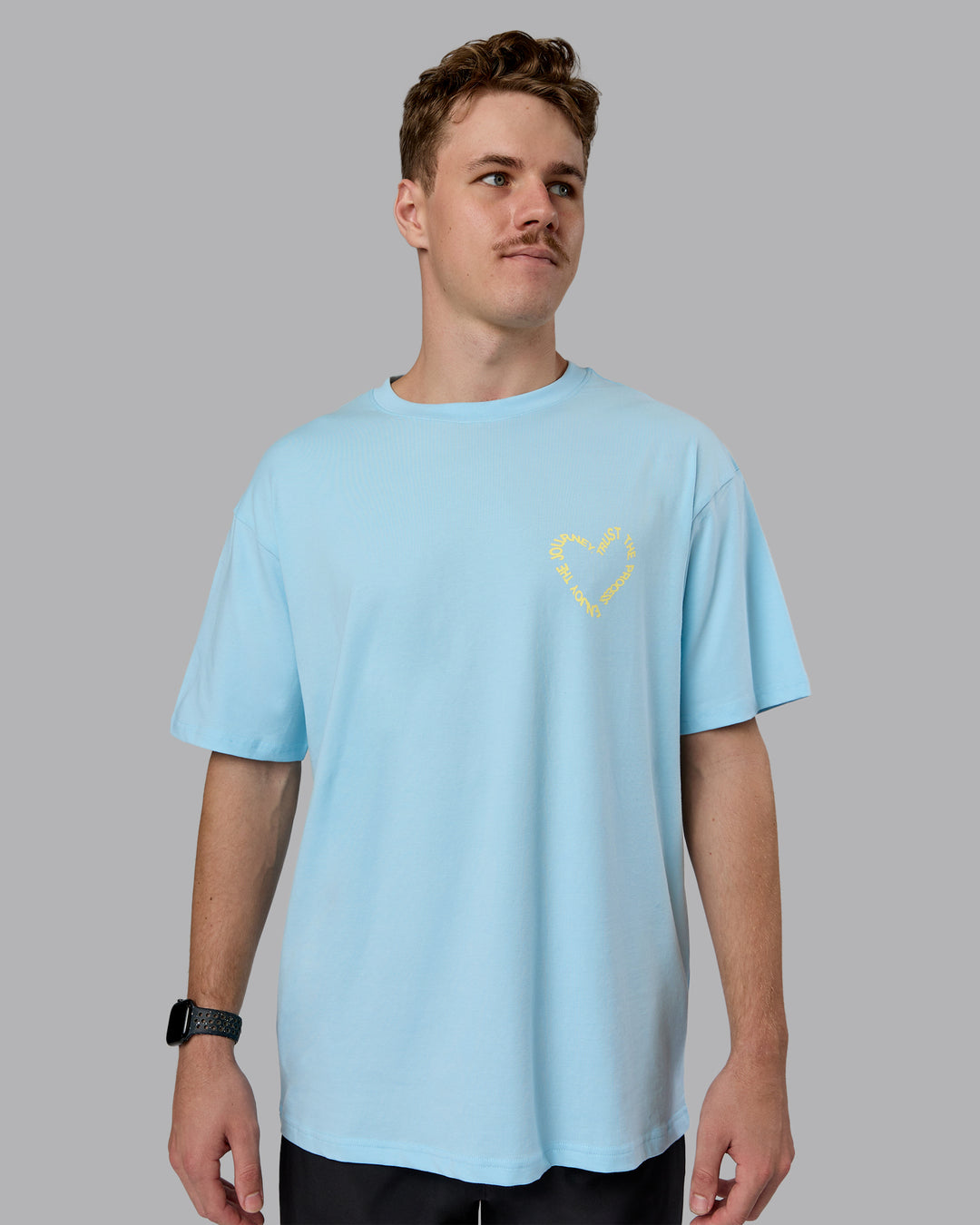 Man wearing Love The Process FLXCotton Oversize Tee - Crystal Blue-Lemon | Model:Cameron | Size:M
