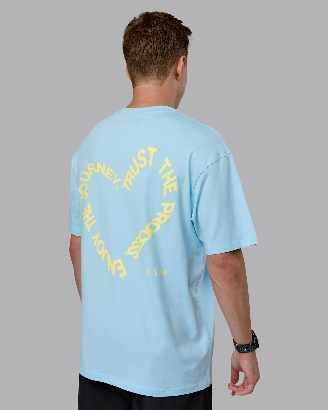 Man wearing Love The Process FLXCotton Oversize Tee - Crystal Blue-Lemon | Model:Cameron | Size:M