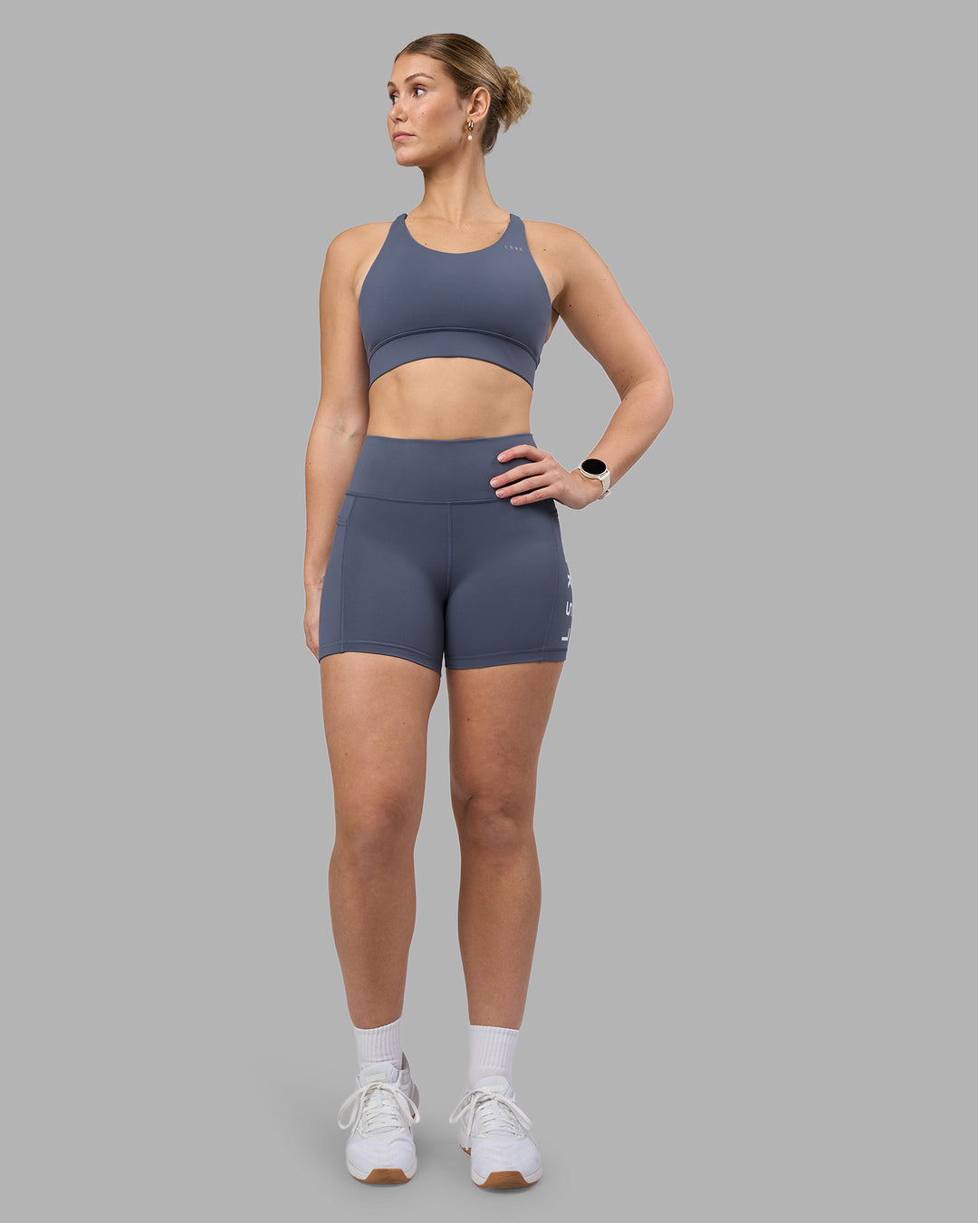 Woman wearing Rep Ultra High-Rise 4" Short Pockets - Night Shadow-White | Model:Amy | Size:M