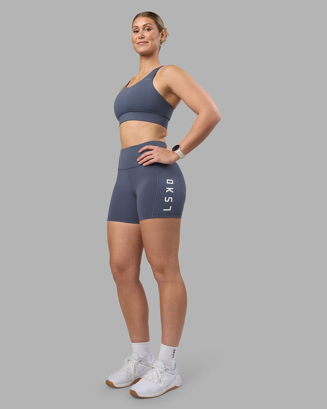 Woman wearing Rep Ultra High-Rise 4" Short Pockets - Night Shadow-White | Model:Amy | Size:M