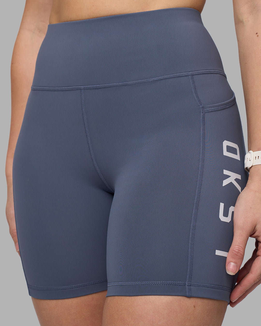 Woman wearing Rep Ultra High-Rise 6" Short Pockets - Night Shadow-White | Model:Amy | Size:M