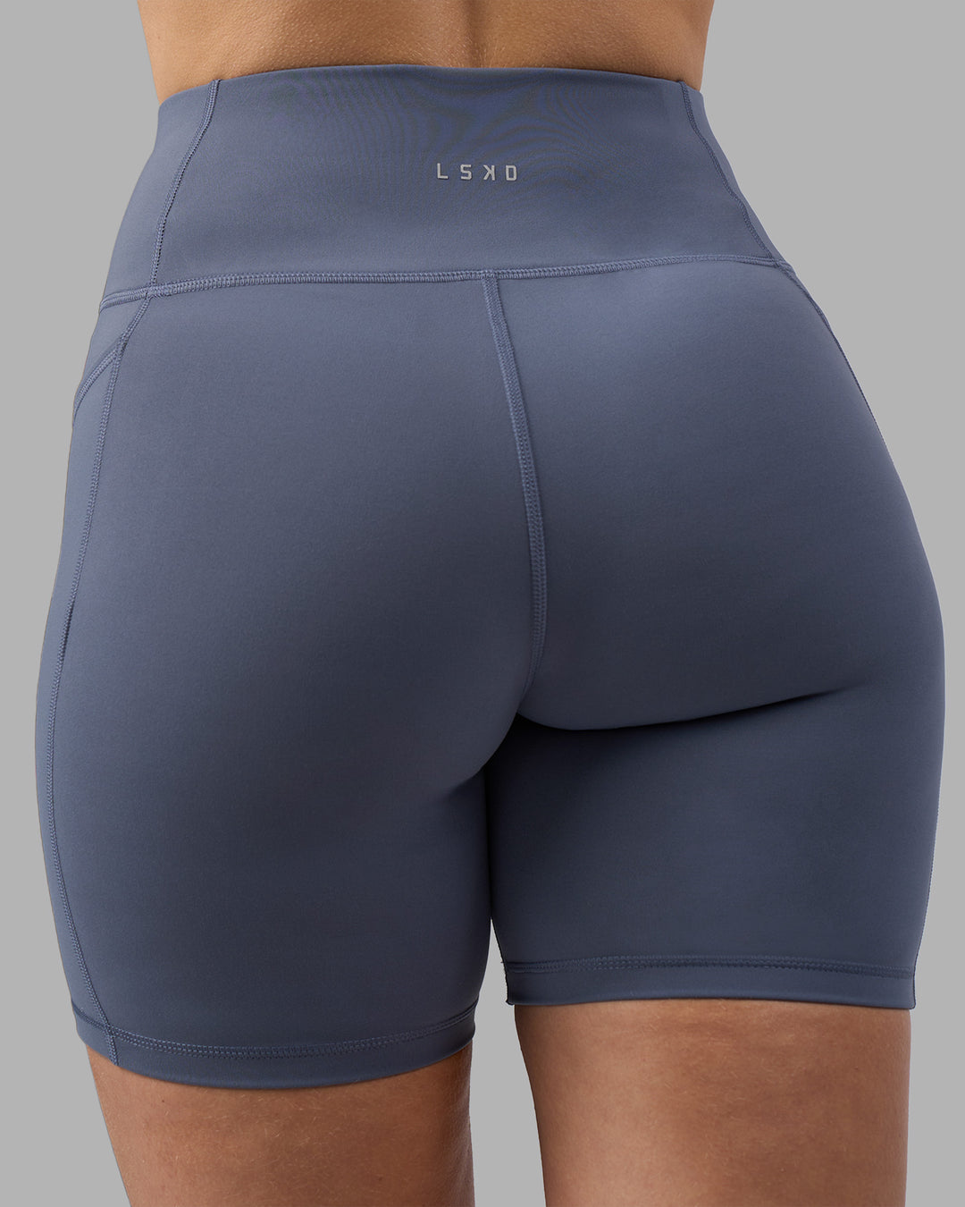 Woman wearing Rep Ultra High-Rise 6" Short Pockets - Night Shadow-White | Model:Amy | Size:M