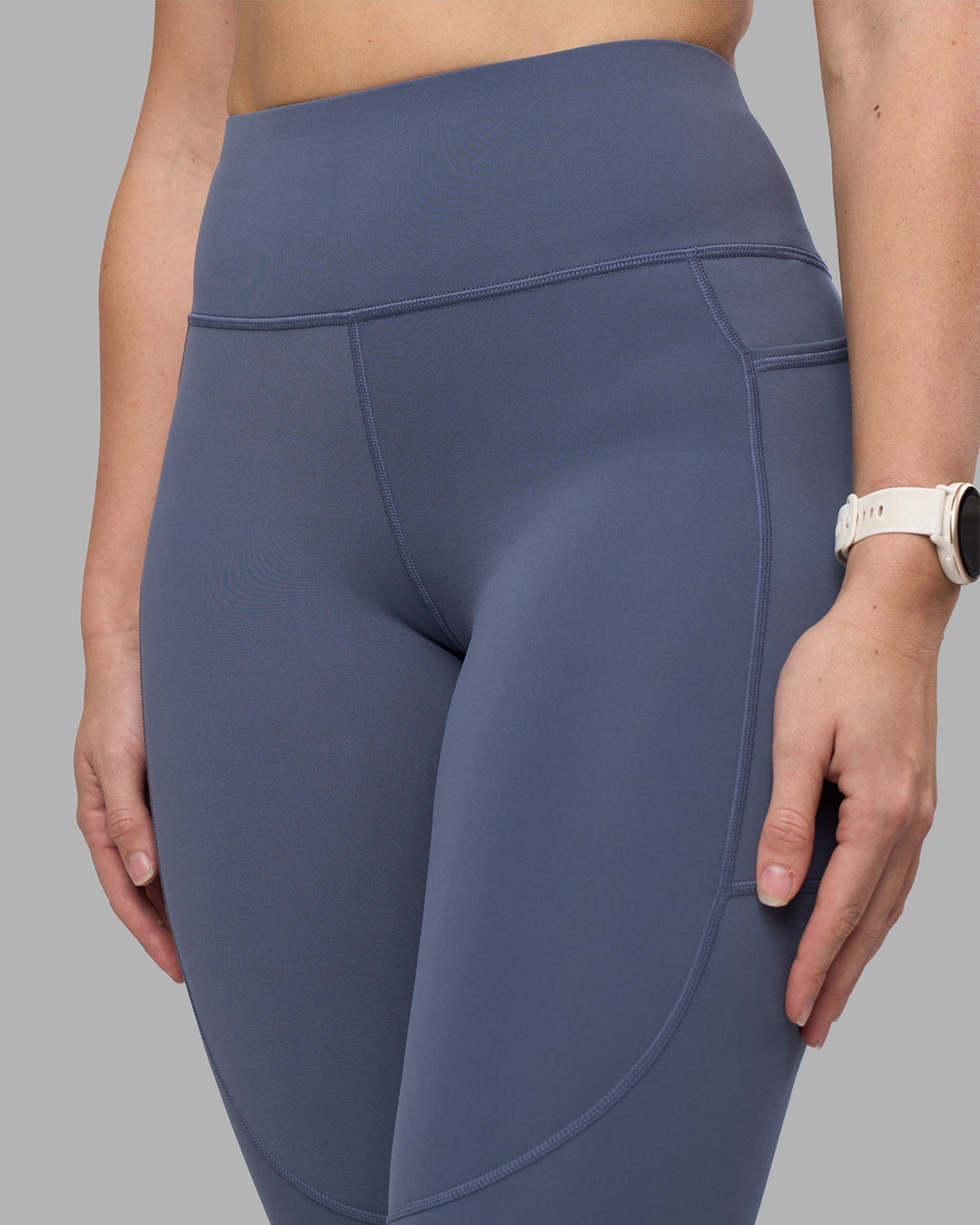Woman wearing Rep Ultra High-Rise 7/8 Legging Pockets - Night Shadow-White | Model:Amy | Size:M