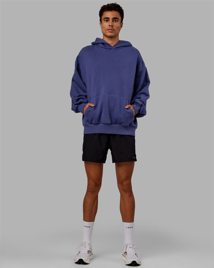 Man wearing Unisex Love The Run Hoodie Oversize - Future Dusk-Galactic Lilac