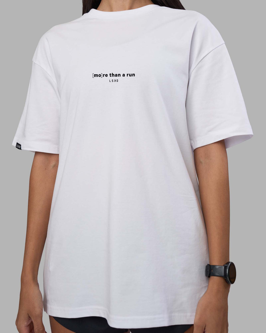Woman wearing MTAR FLXCotton Oversized Tee - White | Model:Rhiley | Size:XS